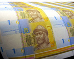 НБУ офіційно знизив курс гривні до долара ще на 13 копійок, а до євро - на 9